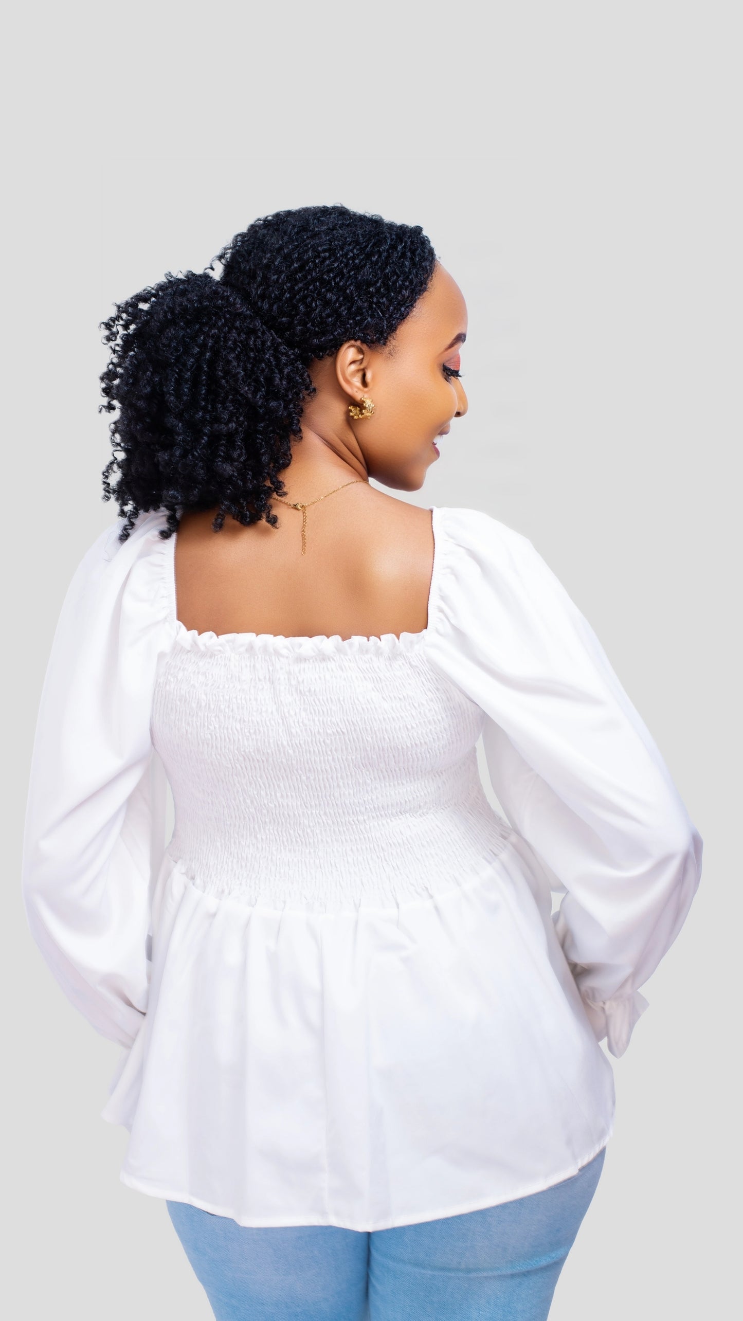 The Fashion Frenzy Smocked Peplum Top - White